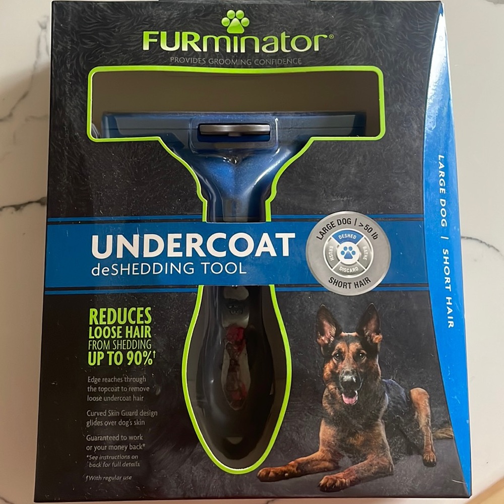 New in box Furminator undercoat deshedding brush for large dogs.